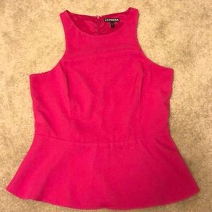 Pink Express peplum top with zipper in back.